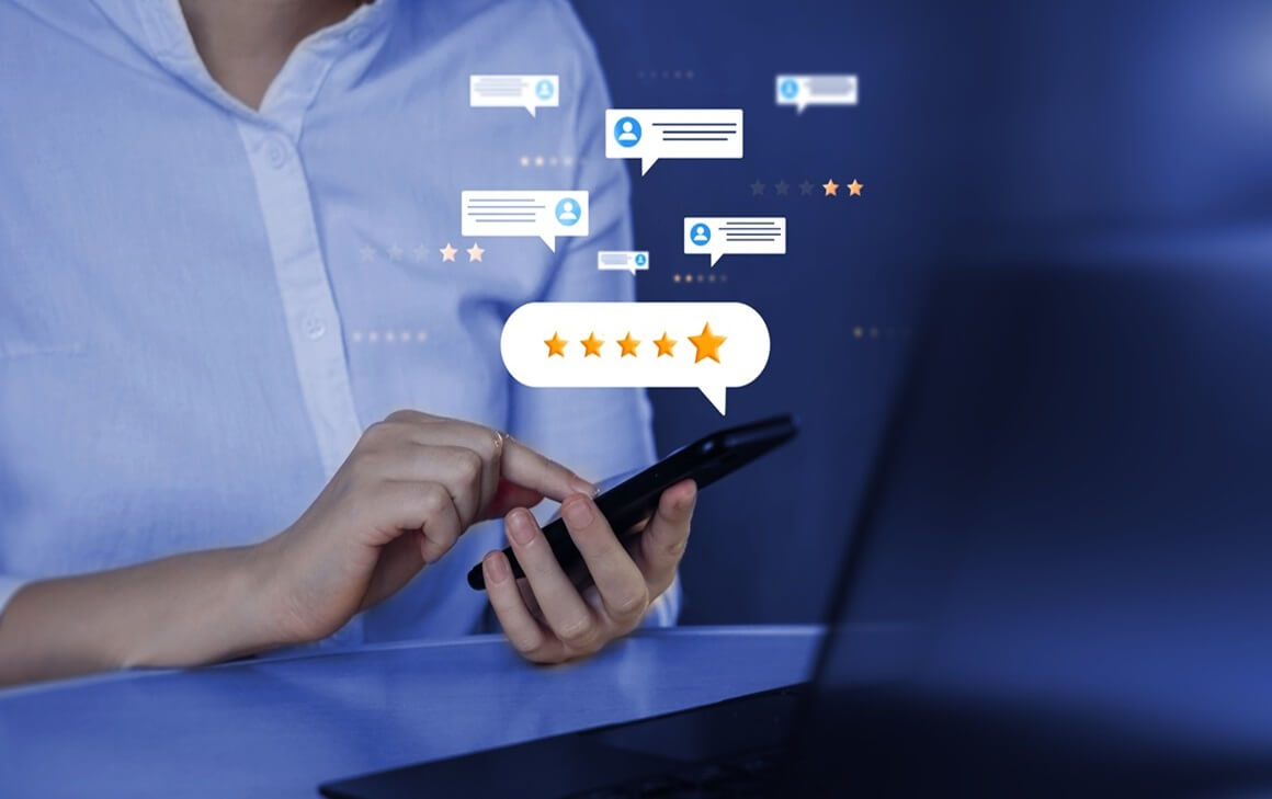 Woman holding cell phone with social media comments and reviews