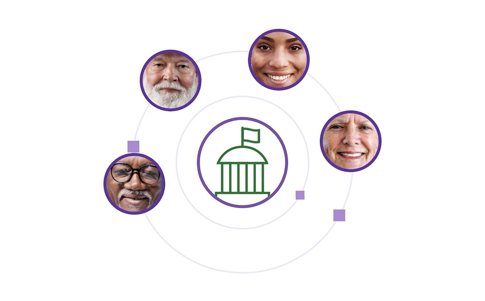 Four diverse adult faces around a symbol of a building with a flag