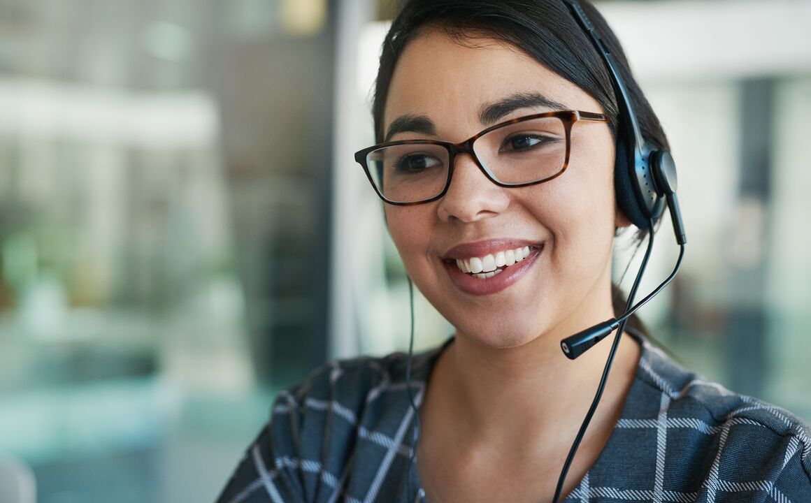 CSR wearing headset in call center