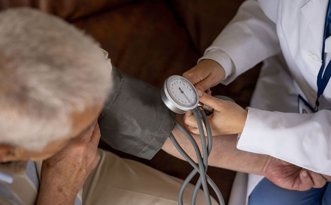 Doctor holding a blood pressure tool